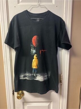 !it jeans Black Graphic Tee with Yellow Coat and Red Balloon. Faded, Has Hole